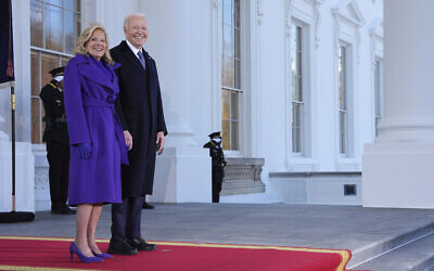 US President Joe Biden, right, and first lady Jill Biden stand before greeting President-elect Donald Trump and Melania Trump upon arriving at the White House, January 20, 2025, in Washington. (AP Photo/Evan Vucci)