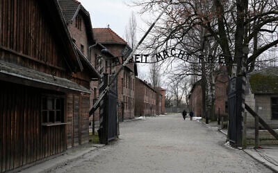People visit the Memorial and Museum Auschwitz-Birkenau, a former Nazi German concentration and extermination camp, in Oswiecim, Poland, Sunday, Jan. 26, 2025. (AP Photo/Czarek Sokolowski)