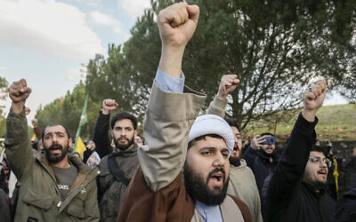 Locals shout slogans against Israel soldiers blocking a road leading to their southern Lebanese village of Maroun al-Ras, Lebanon, January 27, 2025. (AP Photo/Bilal Hussein)