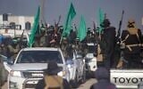 A crowd greets Islamic Jihad and Hamas terror operatives as they arrive for the handover of hostages to the Red Cross in the south Gaza Strip town of Khan Younis, Jan. 30, 2025. (AP Photo/Jehad Alshrafi)