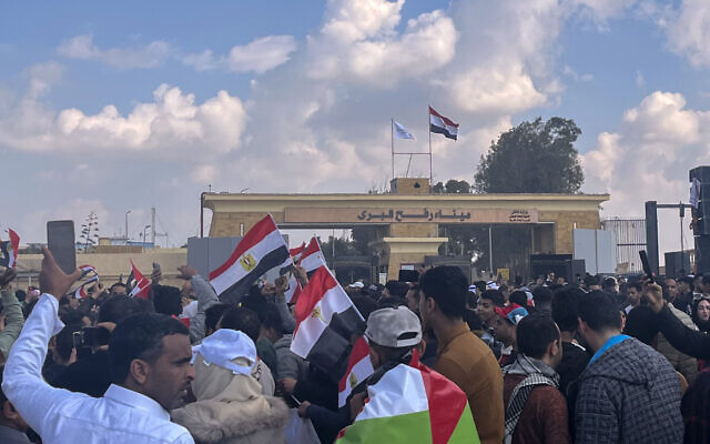 Hundreds of Egyptians gather in front of the Rafah Border Crossing between Egypt and the Gaza Strip, to show solidarity with the Palestinians and to reject the proposed displacement plans, January 31, 2025. (AP Photo/Mohammed Arafat)