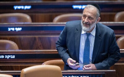 Shas chairman Aryeh Deri attends a vote at the assembly hall of Knesset in Jerusalem, on December 31, 2024. (Chaim Goldberg/ Flash90)