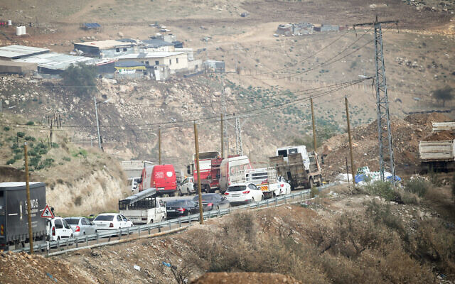 Palestinians wait at an Israeli checkpoint between the West Bank cities of Nablus and Jenin, January 11, 2025. (Nasser Ishtayeh/Flash90) Palestinians wait at an Israeli checkpoint between the West Bank cities of Nablus and Jenin, January 11, 2025. (Nasser Ishtayeh/Flash90)