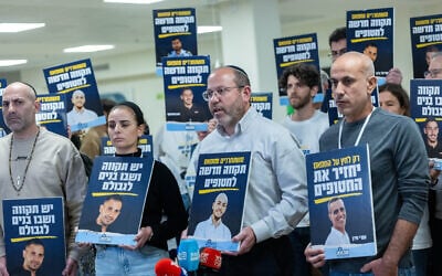 Families of hostages and slain soldiers from the Tikva Forum hold a press conference at the Knesset on January 13, 2025. (Yonatan Sindel/Flash90)