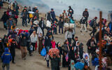 Displaced Palestinians make their way back to their homes in the northern Gaza Strip on January 27, 2025. (Photo by Ali Hassan/Flash90)