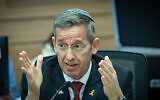 Cabinet Secretary Yossi Fuchs attends a debate on ultra-Orthodox enlistment in the Knesset Foreign Affairs and Defense Committee, January 27, 2025. (Yonatan Sindel/Flash90)