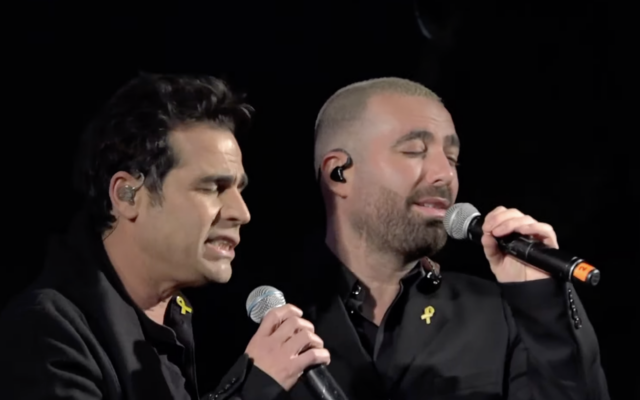 Aviv Geffen, left, and Omer Adam, perform at Tel Aviv Hostages Square on January 14, 2025 (Screen capture/ YouTube)