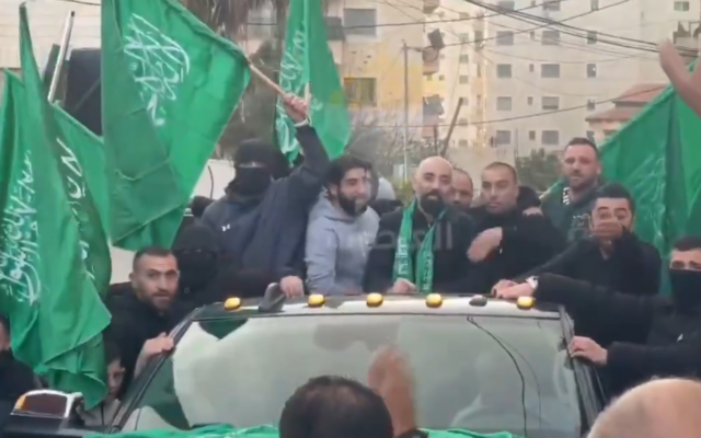 Demonstrators in East Jerusalem's Kafr Aqab neighborhood celebrate the release of former Palestinian prisoner Ashraf Zughayer, convicted of aiding Hamas terror attacks, in a parade on January 25, 2025. (Screenshot, used in accordance with Clause 27a of the Copyright Law)