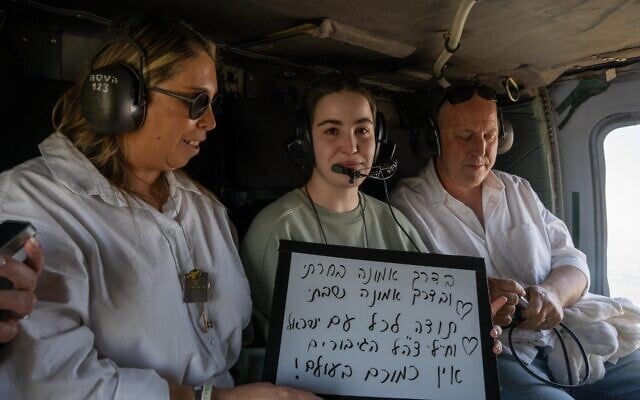 Released hostage Agam Berger and her parents Merav, left, and Shlomi aboard a helicopter on the way to Rabin Medical Center on January 30, 2025. (IDF)