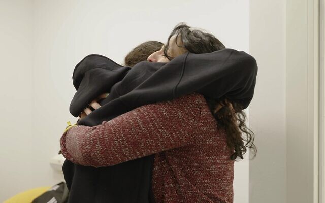 Released hostage Romi Gonen reunites with her mother shortly after returning to Israel after 471 days in Hamas captivity in Gaza, January 19, 2025. (IDF)