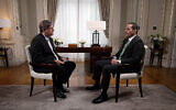 Qatari Prime Minister Mohammed bin Abdulrahman Al-Thani (right) speaks to Channel 12's Arad Nir in Paris, in an interview aired on January 26, 2025. (Screenshot, Channel 12, used in accordance with Clause 27a of the Copyright Law)