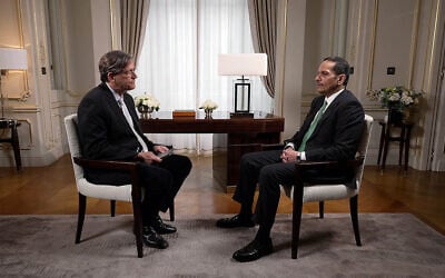 Qatari Prime Minister Mohammed bin Abdulrahman Al-Thani (right) speaks to Channel 12's Arad Nir in Paris, in an interview aired on January 26, 2025. (Screenshot, Channel 12, used in accordance with Clause 27a of the Copyright Law)