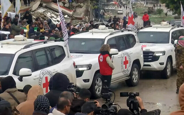 Red Cross vehicles arrive at the site of the expected handing over of Israeli hostages in Rafah, in the southern Gaza Strip on February 22, 2025 (Screen grab/YouTube)