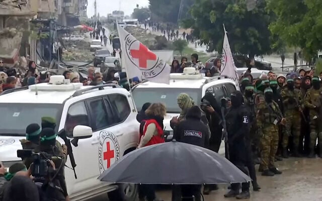Red Cross vehicles at the site of the handover of Israeli hostages in Rafah, in the southern Gaza Strip on February 22, 2025 (Screen grab/YouTube)