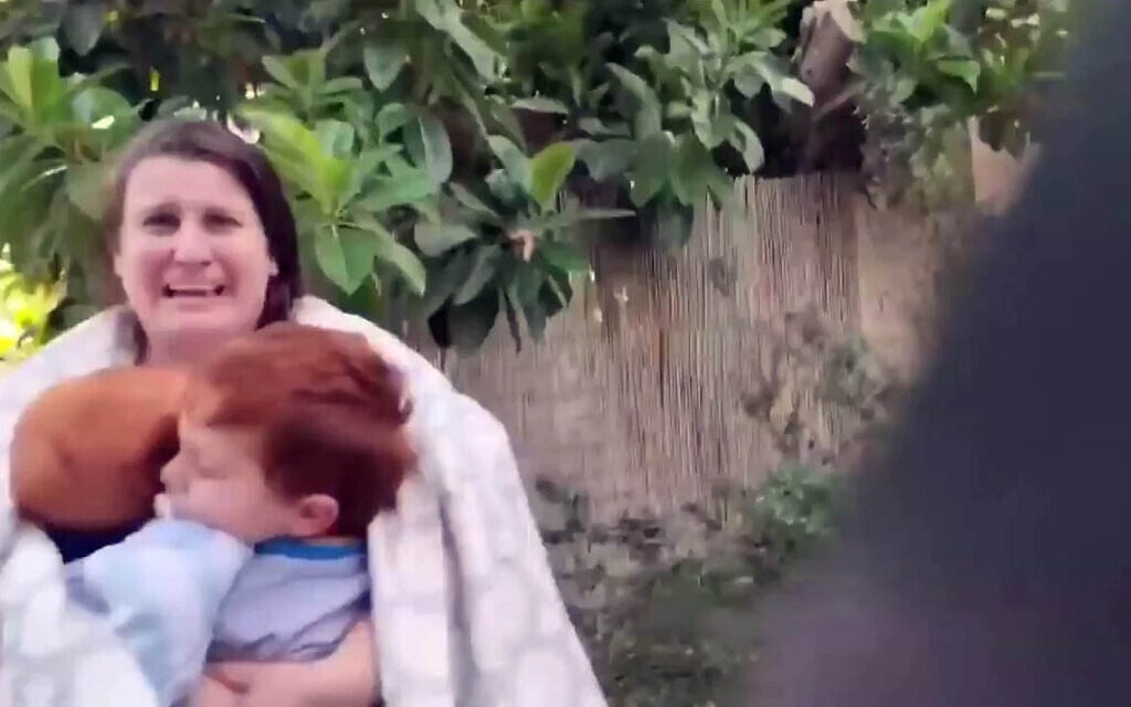 Shiri, Ariel and Kfir Bibas are abducted from Kibbutz Nir Oz on October 7, 2023. (Video screenshot)