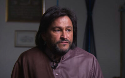 Muhsin Hendricks, 'the world's first openly gay imam,' speaks in a 2023 interview. (Screen capture via YouTube, used in accordance with Clause 27a of the Copyright Law)