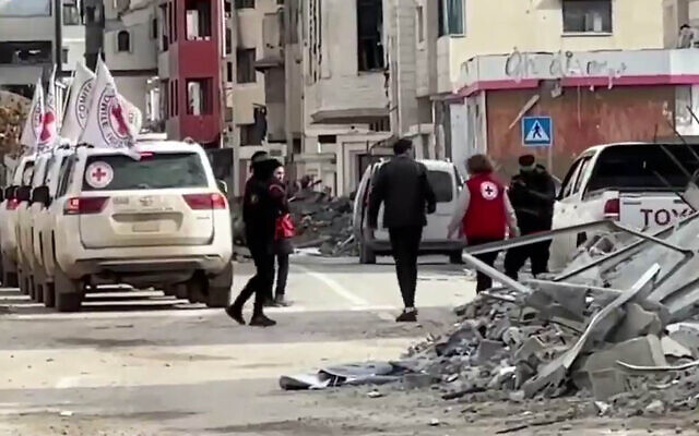Hisham al-Sayed is seen walking with Red Cross officials after his release from captivity in Gaza, February 22, 2025. (X screenshot, used in  accordance with clause 27a of the Copyright Law)