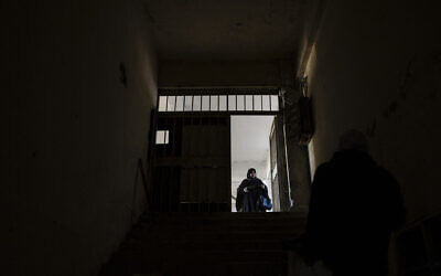 Illustrative: A Syrian man inspects the rooms the prison of Saydnaya, north of Damascus on December 16, 2024. (Sameer Al-DOUMY / AFP)
