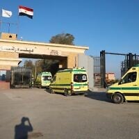 Egyptian ambulances cross the Rafah border crossing towards Gaza on February 1, 2025, to transport Palestinian patients out of the Strip. (Kerolos Salah/AFP)
