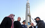 Iran's President Masoud Pezeshkian (C) visits a defense and space achievements exhibition in Tehran, February 2, 2025. (Iranian Presidency / AFP)