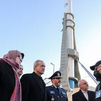 Iran's President Masoud Pezeshkian (C) visits a defense and space achievements exhibition in Tehran, February 2, 2025. (Iranian Presidency / AFP)