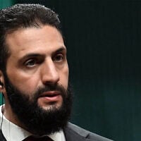 Syria's interim president Ahmed al-Sharaa holds a joint press conference following a meeting with the Turkish president, at the Presidential Palace in Ankara, February 4, 2025. (OZAN KOSE / AFP)