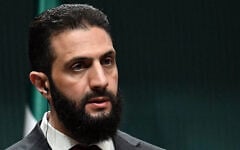 Syria's interim president Ahmed al-Sharaa holds a joint press conference following a meeting with the Turkish president, at the Presidential Palace in Ankara, February 4, 2025. (OZAN KOSE / AFP)