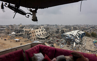 A couch sits at a heavily damaged building along Saftawi street in Jabalia in the northern Gaza Strip on February 5, 2025. (Omar AL-QATTAA / AFP)