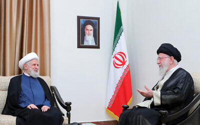 Ayatollah Ali Khamenei during a meeting with then-deputy chief of Lebanon's Hezbollah group Naim Qassem (L) on July 30, 2024 in Tehran. (Iranian Supreme Leader's Website/AFP)