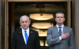 US Secretary of Defense Pete Hegseth (R) places his hand on his heart as he welcomes Israeli Prime Minister Benjamin Netanyahu to the Pentagon in Arlington, Virginia, on February 5, 2025. (Jim WATSON / AFP)