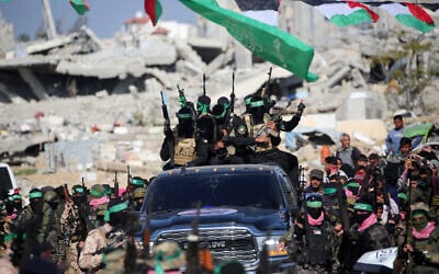 Palestinian Hamas terrorist fighters in Khan Yunis in the southern Gaza Strip on February 15, 2025. (Eyad BABA / AFP)