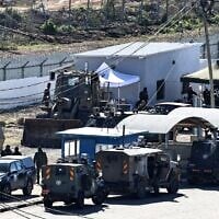IDF troops assemble at the Ofer military prison complex, between Ramallah and Beitunia in the West Bank, before releasing Palestinian prisoners as part of a hostage-prisoner exchange on February 15, 2025. (Zain Jaafar / AFP)