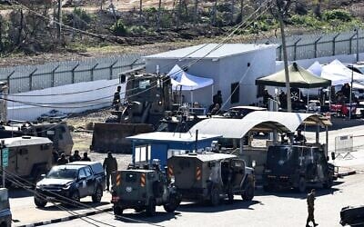 IDF troops assemble at the Ofer military prison complex, between Ramallah and Beitunia in the West Bank, before releasing Palestinian prisoners as part of a hostage-prisoner exchange on February 15, 2025. (Zain Jaafar / AFP) IDF troops assemble at the Ofer military prison complex, between Ramallah and Beitunia in the West Bank, before releasing Palestinian prisoners as part of a hostage-prisoner exchange on February 15, 2025. (Zain Jaafar / AFP)