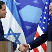 US Secretary of State Marco Rubio (L) and Prime Minister Benjamin Netanyahu shake hands during a press conference at the Prime Minister's Office in Jerusalem, on February 16, 2025. (Evelyn Hockstein / POOL / AFP)