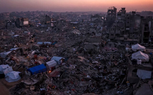 Tents belonging to Palestinians are seen amid the rubble of destroyed buildings in Jabalia, in the northern Gaza Strip, on February 18, 2025, as people return to northern parts of Gaza during a ceasefire deal in the war between Israel and Hamas. (Photo by Omar AL-QATTAA / AFP) Tents belonging to Palestinians are seen amid the rubble of destroyed buildings in Jabalia, in the northern Gaza Strip, on February 18, 2025, as people return to northern parts of Gaza during a ceasefire deal in the war between Israel and Hamas. (Photo by Omar AL-QATTAA / AFP)