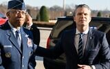 US Defense Secretary Pete Hegseth, alongside Chairman of the Joint Chiefs of Staff General Charles Q. Brown, Jr. (L), speaks with the media during his first official arrival at the Pentagon as secretary, in Washington on January 27, 2025. (Saul Loeb/AFP)