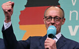 Friedrich Merz, leader of Germany's conservative Christian Democratic Union (CDU) and his party's main candidate for Chancellor, addresses supporters in Berlin after the first exit polls in the German general elections were announced on TV, February 23, 2025. (Ina Fassbender/AFP)