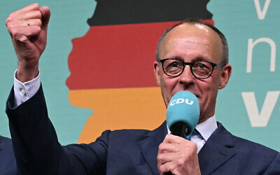 Friedrich Merz, leader of Germany's conservative Christian Democratic Union (CDU) and his party's main candidate for Chancellor, addresses supporters in Berlin after the first exit polls in the German general elections were announced on TV, February 23, 2025. (Ina Fassbender/AFP)
