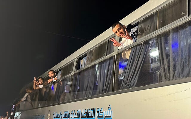 Palestinian prisoners, released by Israel, gesture as they arrive on a bus at the European Hospital in Khan Yunis in the southern Gaza Strip early on February 27, 2025. (Photo by AFP) Palestinian prisoners, released by Israel, gesture as they arrive on a bus at the European Hospital in Khan Yunis in the southern Gaza Strip early on February 27, 2025. (Photo by AFP)