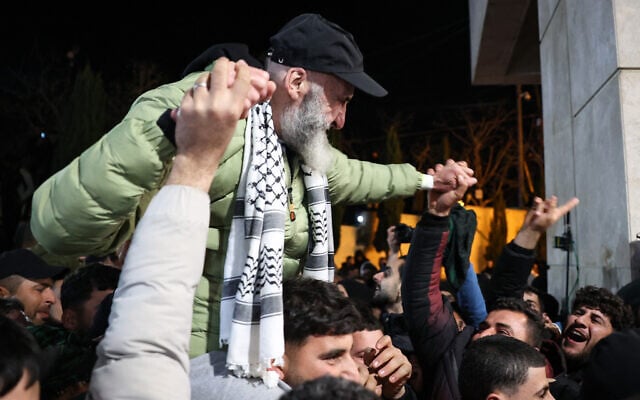 A former Palestinian prisoner, released as part of the seventh hostage-prisoner exchange, is carried on a person's shoulders upon arrival in Ramallah on February 27, 2025. (Zain Jaafar/AFP) A former Palestinian prisoner, released as part of the seventh hostage-prisoner exchange, is carried on a person's shoulders upon arrival in Ramallah on February 27, 2025. (Zain Jaafar/AFP)