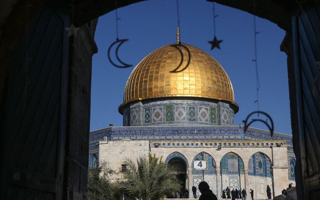 Stars and crescent moons hang at the Temple Mount in Jerusalem’s Old City ahead of the start of the Muslim holy fasting month of Ramadan on February 28, 2025. (AHMAD GHARABLI / AFP)