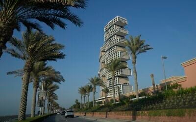 Cars drive by Atlantis The Royal hotel at Palm Jumeirah Island in Dubai United Arab Emirates, June 30, 2023. (AP Photo/Kamran Jebreili)