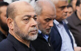 Hamas politburo member Moussa Abu Marzouk, front, attends the funeral of Saleh Arouri, in Beirut, Lebanon, January 4, 2024. (AP/Hussein Malla)