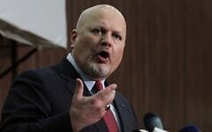 Karim Ahmed Khan, International Criminal Court chief prosecutor, speaks during a news conference at the Ministry of Justice in Khartoum, Sudan, August 12, 2021. (AP Photo/Marwan Ali, File)