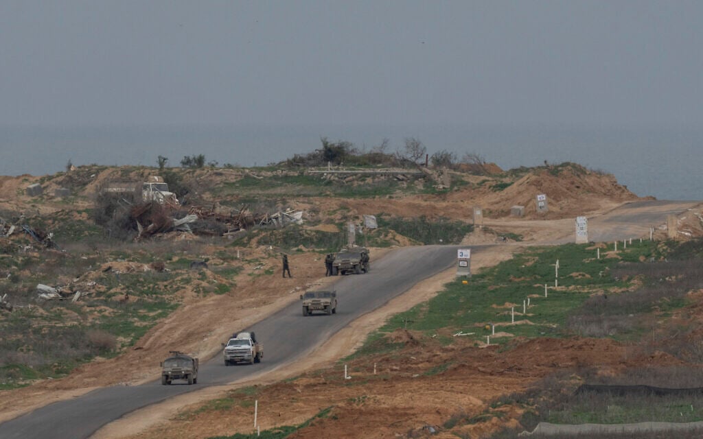 Israeli soldiers inside the northern Gaza Strip as seen from southern Israel, February 9, 2025. (AP Photo/Ohad Zwigenberg)