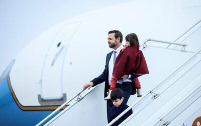 FILE - United States Vice President JD Vance carries his daughter Mirabel as he arrives at Paris Orly Airport, ahead of an Artificial Intelligence Action Summit taking place in Paris, February 10, 2025. (AP Photo/Thomas Padilla, file)