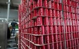 Cans of Chat Cola-branded aluminum cans are stacked, separated by cardboard pallets, on the production line at the Palestinian company's bottling plant in the West Bank city of Salfit, February 13, 2025. (AP Photo/Nasser Nasser)