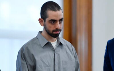 Hadi Matar, charged with severely injuring author Salman Rushdie in a 2022 knife attack, stands in Chautauqua County court in Mayville, N.Y., Friday, Feb. 21, 2025. (AP Photo/Adrian Kraus)