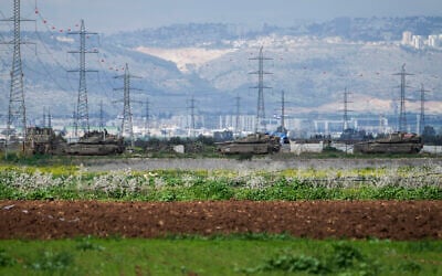 Israeli tanks are seen near the West Bank city of Jenin, February 23, 2025. (AP Photo/Majdi Mohammed)