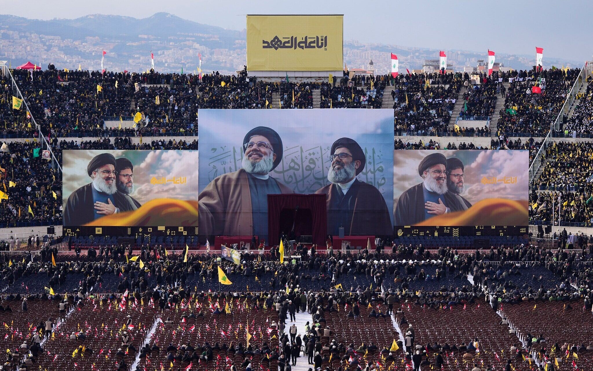 NextImg:Tens of thousands pack stadium for Nasrallah funeral, as Israeli fighters fly overhead